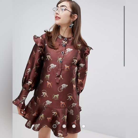 Sister Jane Dresses & Skirts - Sister Jane Size Small Mini Dress with peplum hem and jewel buttons